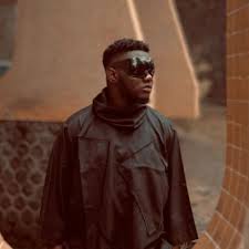 Loic Sumfor performing on stage